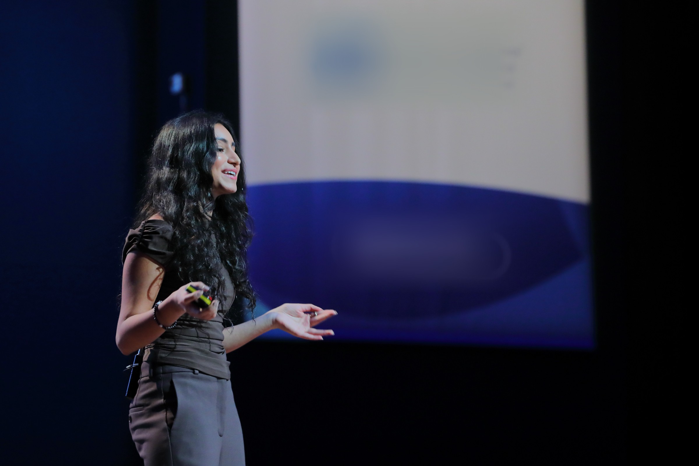 Arissa Roy speaking on stage
